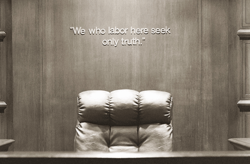 Trial Courtroom, Empty Judge's Seat In Front of Motto 'We Who Labor Here Seek Only Truth'
